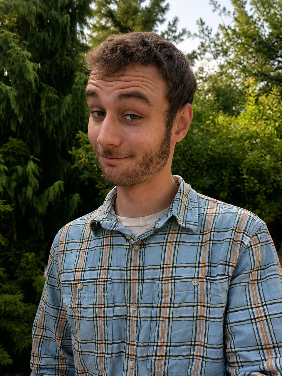 Portrait outdoors in front of trees