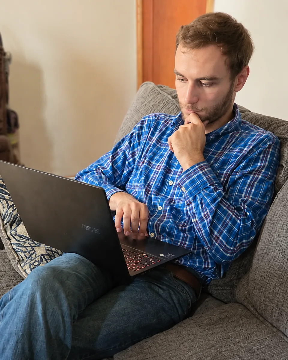 Working on a laptop at home